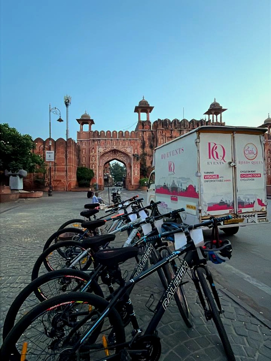 Roads Queen bicycles outside Jaipur's historic city gate